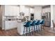 Modern kitchen with stainless steel appliances, granite countertops, ample cabinet space, and a center island with seating at 4827 Hopespring St., Myrtle Beach, SC 29579