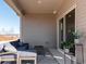 Comfortable outdoor patio with stylish seating, plants, and a serene ambiance at 4827 Hopespring St., Myrtle Beach, SC 29579