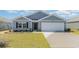 Charming single-story home features a two-car garage, well-manicured lawn, and beautiful curb appeal at 504 Scarlet Sage Dr., Conway, SC 29527