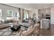 Open-concept living space connects to dining area and kitchen, offering stylish decor and ample natural light at 5060 Riverton Ct, Myrtle Beach, SC 29579