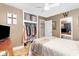 Well-organized bedroom with closet, ceiling fan, hardwood floors, and decor at 508 Pearl St., Conway, SC 29527