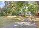 View of a single-story home with a well-maintained lawn and a driveway at 508 Pearl St., Conway, SC 29527