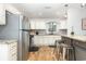 Well-lit kitchen with stainless steel appliances and granite countertops at 508 Pearl St., Conway, SC 29527