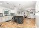 Open-concept kitchen with granite countertops, stainless steel appliances, and hardwood floors at 508 Pearl St., Conway, SC 29527