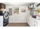 Laundry Room featuring a washer and dryer, storage, and decor at 508 Pearl St., Conway, SC 29527