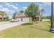 Charming two-story brick home with a well-manicured lawn and a spacious three car driveway at 524 Cottage Oaks Circle, Myrtle Beach, SC 29579