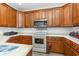 Well-appointed kitchen with wooden cabinetry and modern appliances at 524 Cottage Oaks Circle, Myrtle Beach, SC 29579