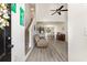 Bright living room features tall ceilings, wood floors, and a staircase at 524 Cottage Oaks Circle, Myrtle Beach, SC 29579