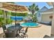 Outdoor patio with a private pool and hot tub perfect for entertaining and relaxing at 546 Olde Mill Dr., North Myrtle Beach, SC 29582