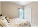 Comfortable bedroom featuring a coastal theme and light teal curtains at 5876 Longwood Dr. # 201, Murrells Inlet, SC 29576