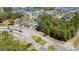 Aerial view of a neighborhood with lush landscaping, lake, and a beautiful blue sky at 600 Waterbridge Blvd., Myrtle Beach, SC 29579