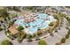 Stunning aerial view of the community pool area with multiple pools, seating, and landscaping at 600 Waterbridge Blvd., Myrtle Beach, SC 29579