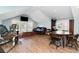 Spacious bonus room with exercise equipment, a desk, and a comfortable seating area at 600 Waterbridge Blvd., Myrtle Beach, SC 29579