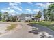 Charming two-story home with a manicured lawn, two car garage, and lush landscaping at 600 Waterbridge Blvd., Myrtle Beach, SC 29579