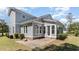 Charming home with a large sunroom and brick paver patio at 600 Waterbridge Blvd., Myrtle Beach, SC 29579