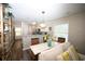 Open floor plan living area with kitchen, dining area, and comfortable seating at 649 Tupelo Ln. # 13A, Longs, SC 29568