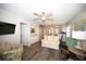 Comfortable living room showcasing hardwood style floors and an entertainment area at 649 Tupelo Ln. # 13A, Longs, SC 29568
