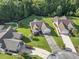 Aerial view of property with manicured lawns, mature trees, and cul-de-sac at 812 Buteo Ct., Myrtle Beach, SC 29588