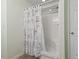 Bathroom including a shower and a curtain with sea shells on it at 812 Buteo Ct., Myrtle Beach, SC 29588