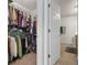 Walk-in closet with ample space, adjacent to bathroom, offering convenient storage solutions at 812 Buteo Ct., Myrtle Beach, SC 29588