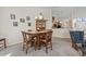 Cozy carpeted dining room off the kitchen area with pendant lighting and plenty of space at 812 Buteo Ct., Myrtle Beach, SC 29588
