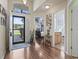 Welcoming foyer with hardwood floors, high ceilings, and views into the bedroom and bathroom at 812 Buteo Ct., Myrtle Beach, SC 29588