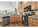Well-lit kitchen with stainless steel appliances and ample counter space, perfect for cooking and entertaining at 812 Buteo Ct., Myrtle Beach, SC 29588
