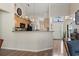 Bright, open-concept living space featuring hardwood floors, modern lighting, and a welcoming atmosphere at 812 Buteo Ct., Myrtle Beach, SC 29588
