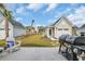 Nice backyard features a grill, patio furniture and a fenced in area at 9012 Mabel Ct., Longs, SC 29568