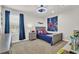 Well decorated room features a ceiling fan, themed tapestry and window with natural light at 9012 Mabel Ct., Longs, SC 29568