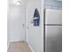 View of entry hallway with coat rack and boat decor with view of stainless steel refrigerator at 9501 Shore Dr. # B-316, Myrtle Beach, SC 29572