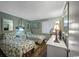 Shared bedroom with two twin beds, nautical decor, and lots of natural light at 9570 Shore Dr. # 204, Myrtle Beach, SC 29572