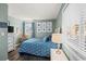 Comfortable bedroom featuring nautical decor, calming colors, and natural light at 9570 Shore Dr. # 204, Myrtle Beach, SC 29572