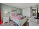 Bright and airy bedroom features white furniture and a comfortable bed, with lots of natural light at 9570 Shore Dr. # 204, Myrtle Beach, SC 29572