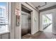 Building elevator providing easy access to the property, located in a well-maintained corridor at 9570 Shore Dr. # 204, Myrtle Beach, SC 29572