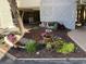 Landscaped exterior of condo complex with flower pots, flower bed and decorations at 9570 Shore Dr. # 204, Myrtle Beach, SC 29572