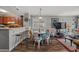 Open concept living area with dining space, breakfast bar, and comfortable seating, ideal for relaxation and gatherings at 9570 Shore Dr. # 204, Myrtle Beach, SC 29572