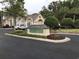 Savannah Shores community entrance with decorative sign, guard house, and landscaping at 9739 Leyland Dr. # 12, Myrtle Beach, SC 29572