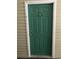 Condo unit front door with a white door frame and a green door at 9739 Leyland Dr. # 12, Myrtle Beach, SC 29572