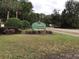 Savannah Shores community sign set amongst a lush green landscaped entrance at 9739 Leyland Dr. # 12, Myrtle Beach, SC 29572