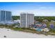 Beautiful aerial view of the beachfront condo, highlighting pool and easy beach access at 9820 Queensway Blvd. # 105, Myrtle Beach, SC 29572