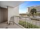 Balcony overlooking street, ocean, and nearby beach-front hotel, the perfect place to relax and enjoy the sea breeze at 9820 Queensway Blvd. # 105, Myrtle Beach, SC 29572