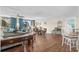 Spacious living area with lovely decor, hardwood floors, and ocean views at 9820 Queensway Blvd. # 105, Myrtle Beach, SC 29572