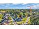 Aerial photo of the community highlighting the home's proximity to the community pool and clubhouse at 107 Long Bay Golf Pl., Longs, SC 29568