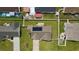 Home with solar panels, a large yard and a white fence to provide privacy and define the backyard at 1117 Jumper Trail Circle, Myrtle Beach, SC 29588