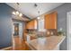 Efficient kitchen with modern appliances, light wood cabinets, and a breakfast bar at 1117 Jumper Trail Circle, Myrtle Beach, SC 29588