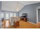 Bright living room with vaulted ceilings, hardwood floors, and a cozy sectional sofa at 1117 Jumper Trail Circle, Myrtle Beach, SC 29588