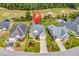 Aerial view of the home showcasing its location near a golf course and desirable community amenities at 120 Whitemarsh Ct., Murrells Inlet, SC 29576