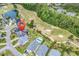 Property aerial view highlighting golf course proximity and the neighborhood's attractive layout at 120 Whitemarsh Ct., Murrells Inlet, SC 29576