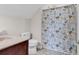 Bathroom with a stylish shower curtain featuring a beach-themed pattern at 120 Whitemarsh Ct., Murrells Inlet, SC 29576